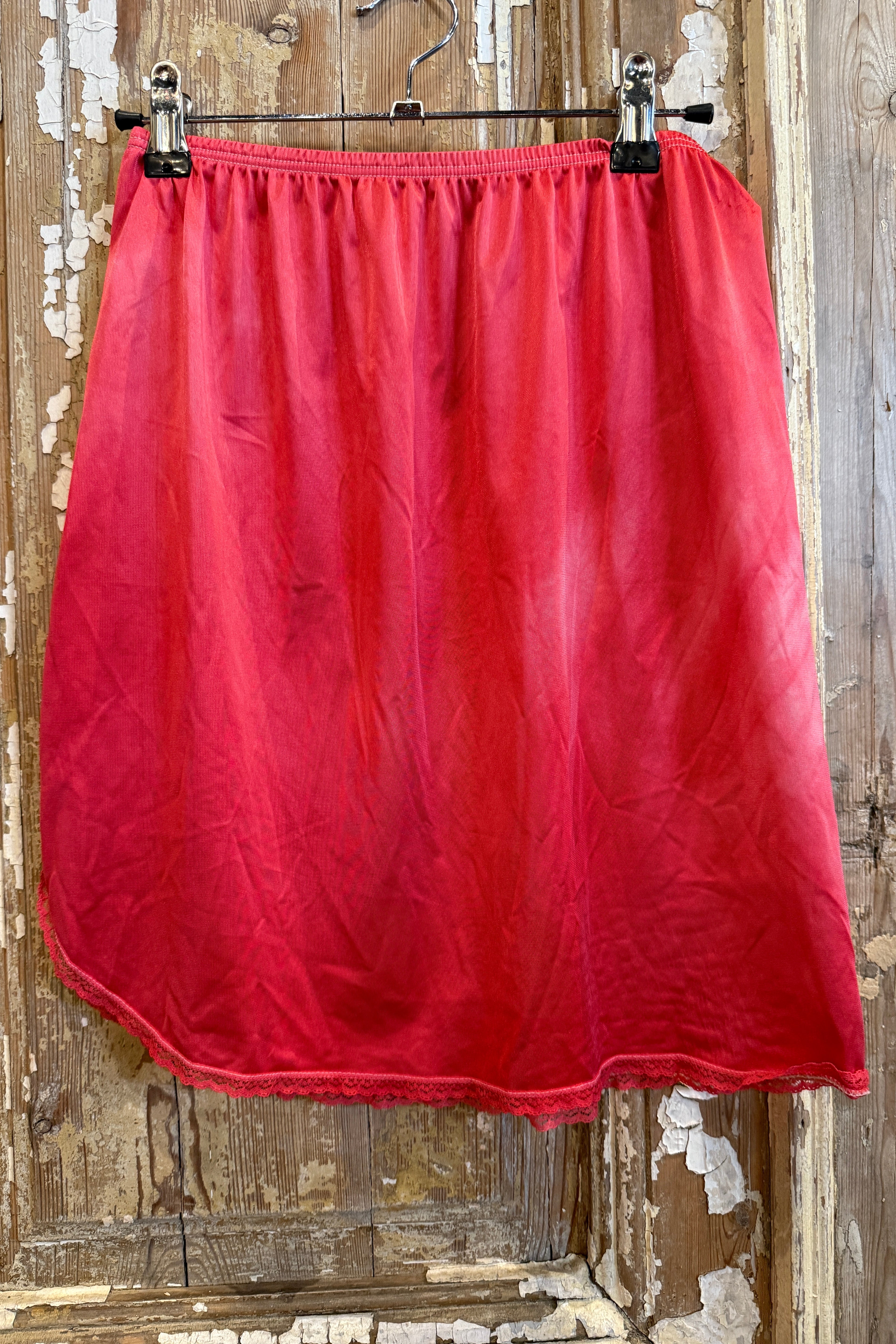 Red fabric on a wooden surface